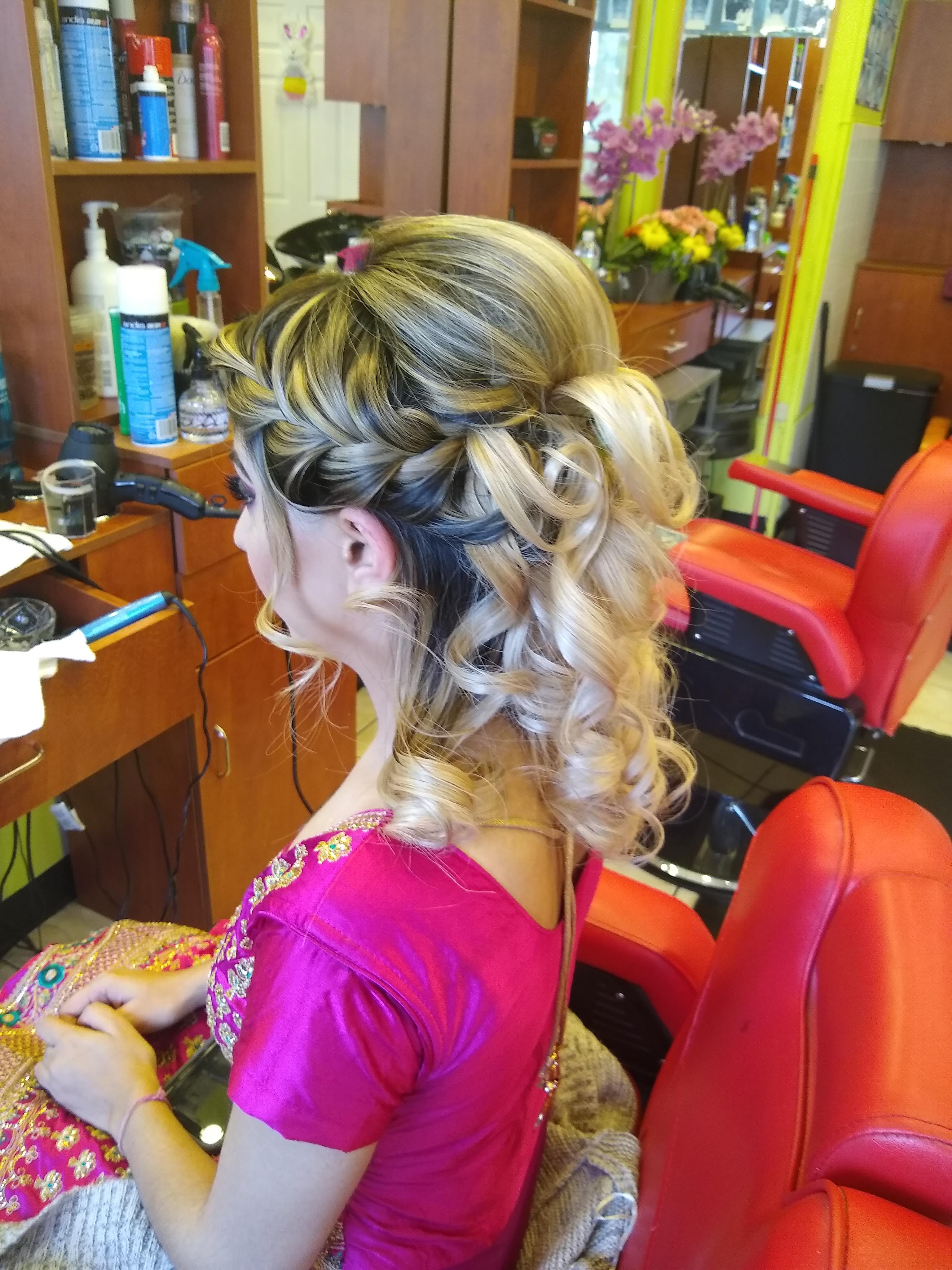 Formal braided half-up hairstyle created in Goshen, NY